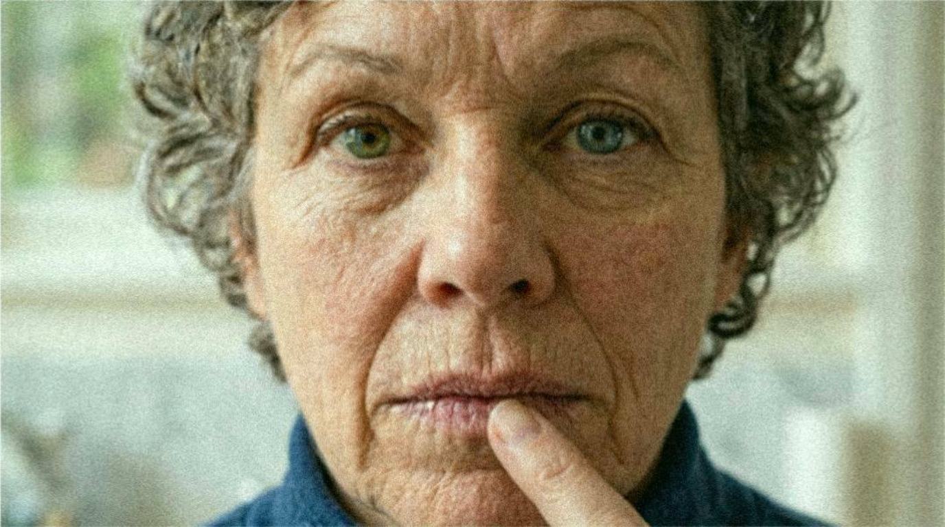 October 2025 - Age 58: Close-up showing lost volume, vertical lines, thin lip border, and flat shapeless lips